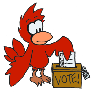 A cardinal casts his paper ballot in an old-fashioned wooden voting box with a slot in the top and a padlock keeping it closed. The box reads "VOTE!".