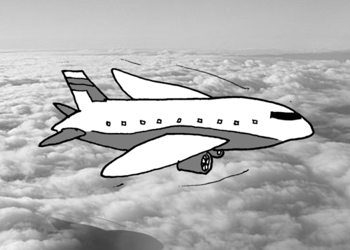 A passenger jet flies above the clouds.